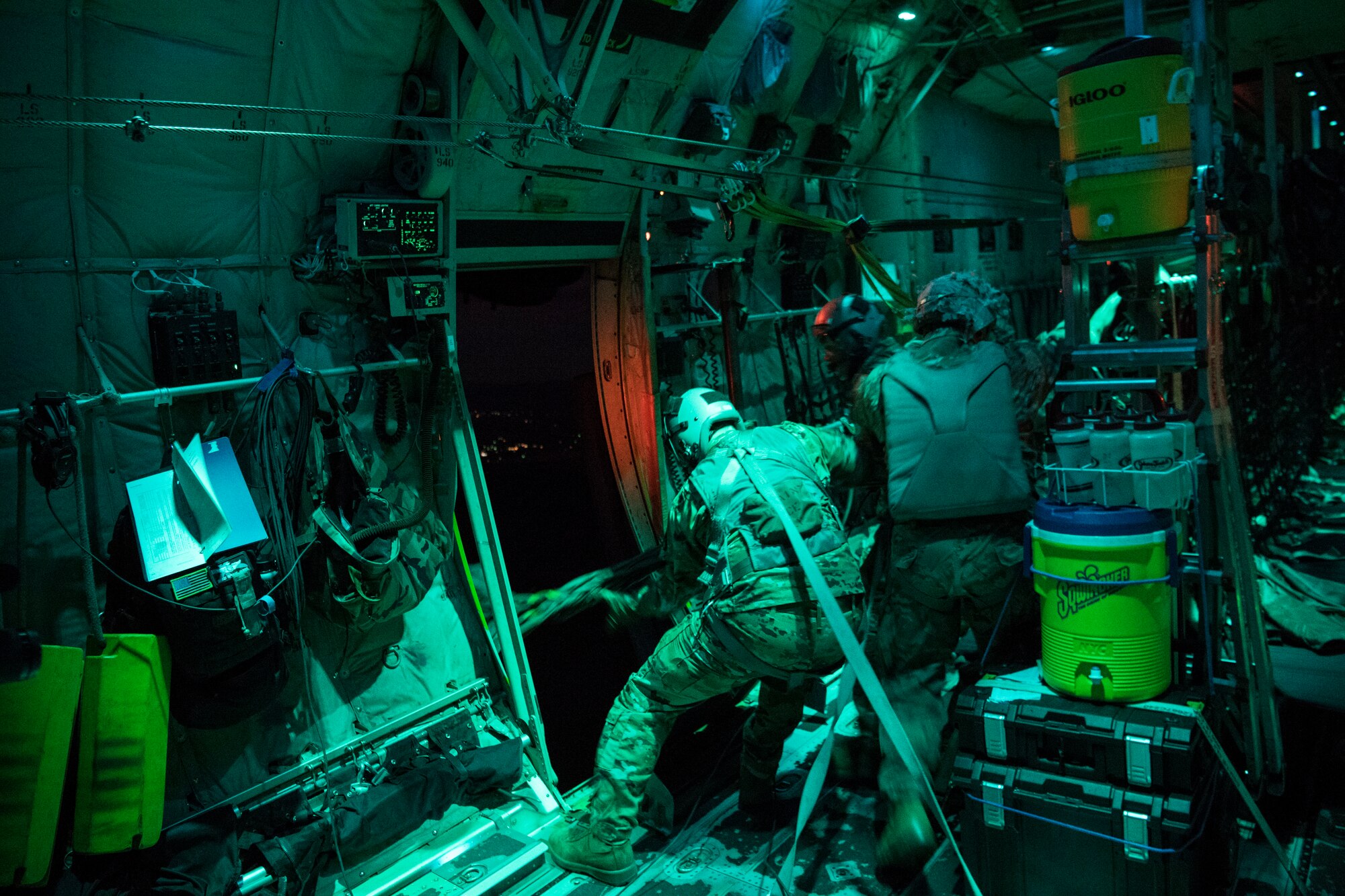 Airmen are on a plane.