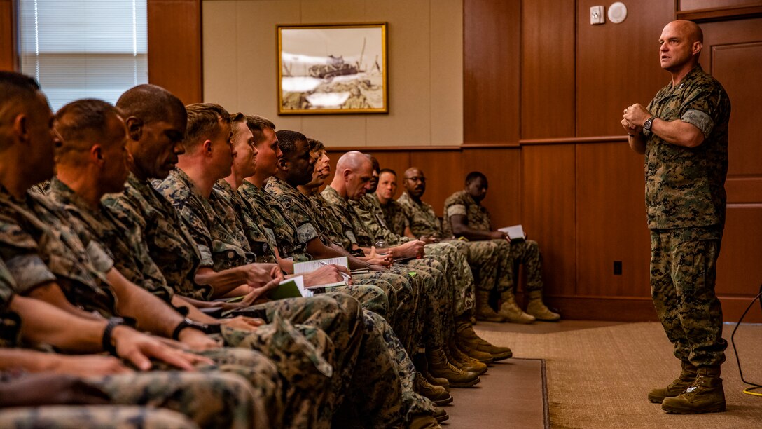 U.S. Marine Corps Lt. Gen. David G. Bellon, right, commander of Marine Forces Reserve and Marine Forces North, speaks to the staff noncommissioned officers of MARFORRES during a meeting at Marine Corps Support Facility New Orleans, Oct. 7, 2019. During the meeting, Bellon spoke about the importance of enforcing Marine Corps standards, challenging small unit leaders and being ready to fight near peer threats as an expeditionary force. (U.S. Marine Corps photo by Lance Cpl. Jose Gonzalez)