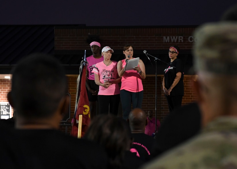 Christine Stiefel, Army Community Service school liaison, speaks during a Breast Cancer Awareness 5K run at Joint Base Langley-Eustis, Virginia, Oct. 4, 2019.