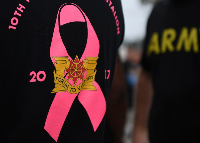 A U.S. Army Soldier wears a Breast Cancer Awareness battalion shirt during a 5K run at Joint Base Langley-Eustis, Virginia, Oct. 4, 2019.
