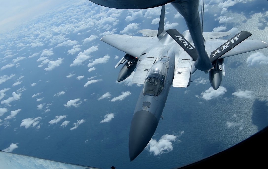 An F-15E Strike Eagle assigned to the 48th Fighter Wing at RAF Lakenheath, England, prepares to receive fuel from a KC-135 Stratotanker assigned to the 100th Air Refueling Wing during a readiness exercise over England, Oct. 3, 2019. Exercise scenarios were designed to ensure 100th ARW Airmen were fully prepared for potential contingencies in the wing’s area of responsibility. (U.S. Air Force photo by Airman 1st Class David Busby)