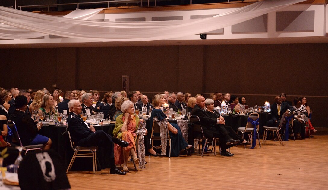 Members of Team BLAZE listen to guest speaker, retired Gen. Lloyd “Fig” Newton, during the 14th Flying Training Wing’s Air Force Birthday Ball Sept. 28, 2019, in Columbus, Miss. Over 380 people attended the ball. (U.S. Air Force photo by Senior Airman Keith Holcomb)