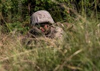 Alberto G. Velazquez, a recruit with Platoon 3074, Company M, 3rd Recruit Training Battalion, Recruit Training Regiment, sights in with the M16A4 Service Rifle during the crucible aboard Marine Corps Recruit Depot Parris Island, South Carolina on Sept. 26, 2019. Velazquez, a native of Lake Worth, Florida, has endured 11 weeks of Marine Corps recruit training preparing for the crucible. (U.S. Marine Corps photo by Cpl. Jack A. E. Rigsby)