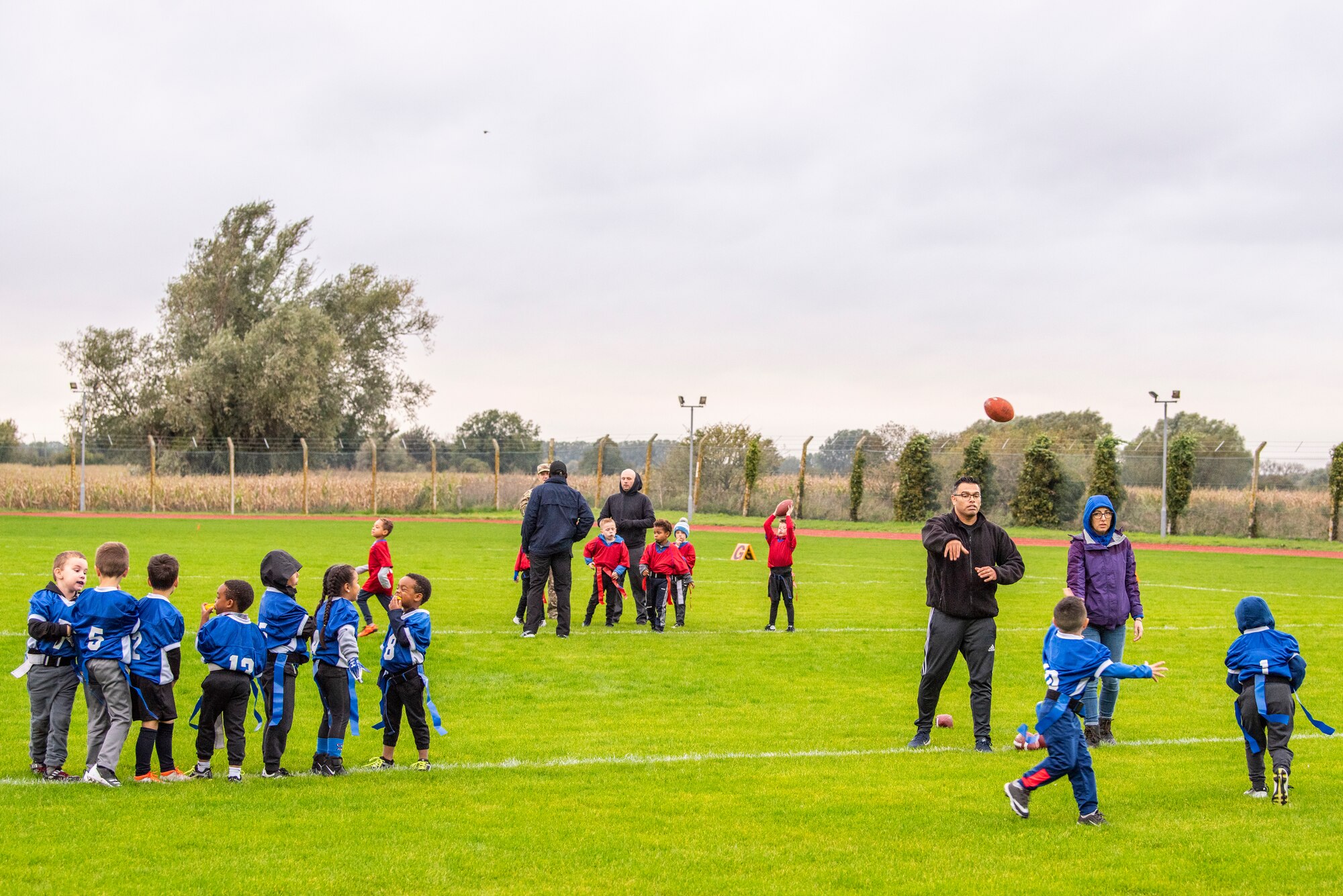 A flag football team warms up for their game at Heritage Park Oct. 7, 2019, at RAF Mildenhall, England. The park reopened following a six-month renovation. (U.S. Air Force photo by Airman 1st Class Joseph Barron)