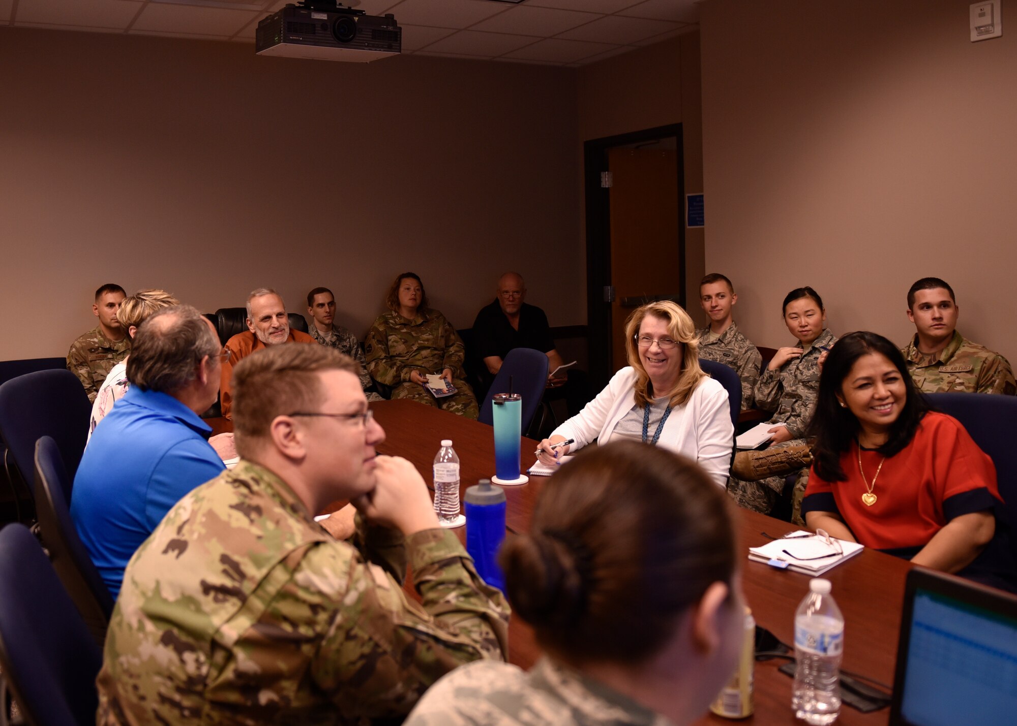 Members of the 21st Comptroller squadron gather to discuss how end of the fiscal year closeout is proceeding Sept. 30, 2019 at Peterson Air Force Base, Colorado. Peterson’s Finance Office doesn’t just cover the 21st Space Wing, but also all tenant units located on Peterson AFB. (U.S. Air Force photo by Airman Alexis Christian)