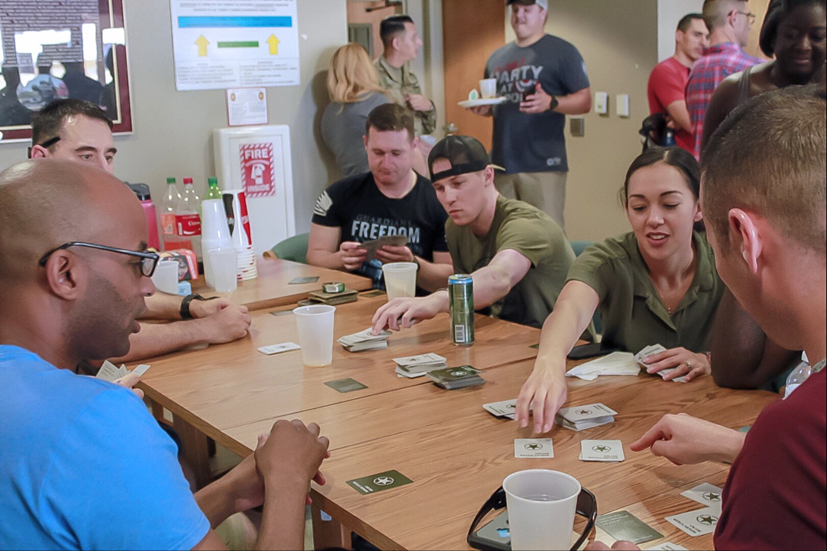 Soldiers at the Warrior Transition Battalion Liberty Barracks at Joint Base San Antonio-Fort Sam Houston enjoy a game of cards.