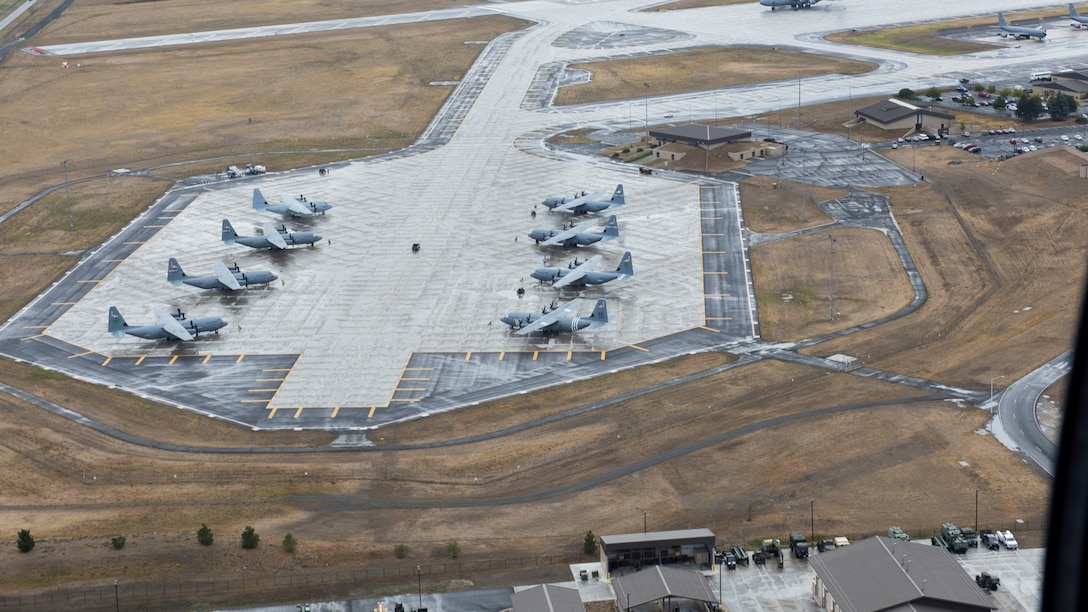 An arrangement of aircraft on a flightline taken from the air