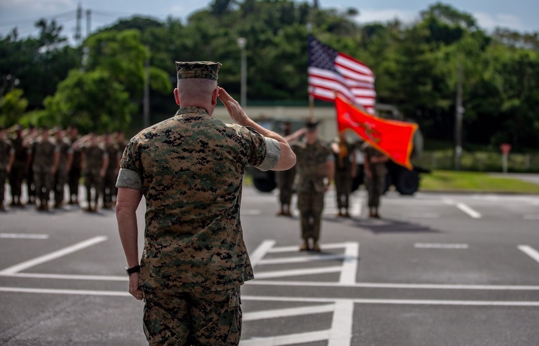 U.S. Marine Maj. Gen. William M. Jurney, Commanding General of 3rd Marine Division, renders a salute during the 12th Marine Regiment 92nd Anniversary Battle Colors Rededication Ceremony on Camp Hansen, Okinawa, Japan, Oct. 4, 2019. The ceremony is an opportunity for Marines to remember warriors past and to recognize contributions of service members and families to current operations.