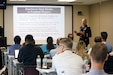 Retired U.S. Army Col. (Dr.) Francis G. O'Connor, a professor in Military and Emergency Medicine and the medical director for the Consortium on Health and Military Performance, Uniformed Services University, lectures students at the University of Arkansas for Medical Sciences – Northwest Regional Campus on strategies to prevent exertional heat illnesses in athletes, Aug. 27.