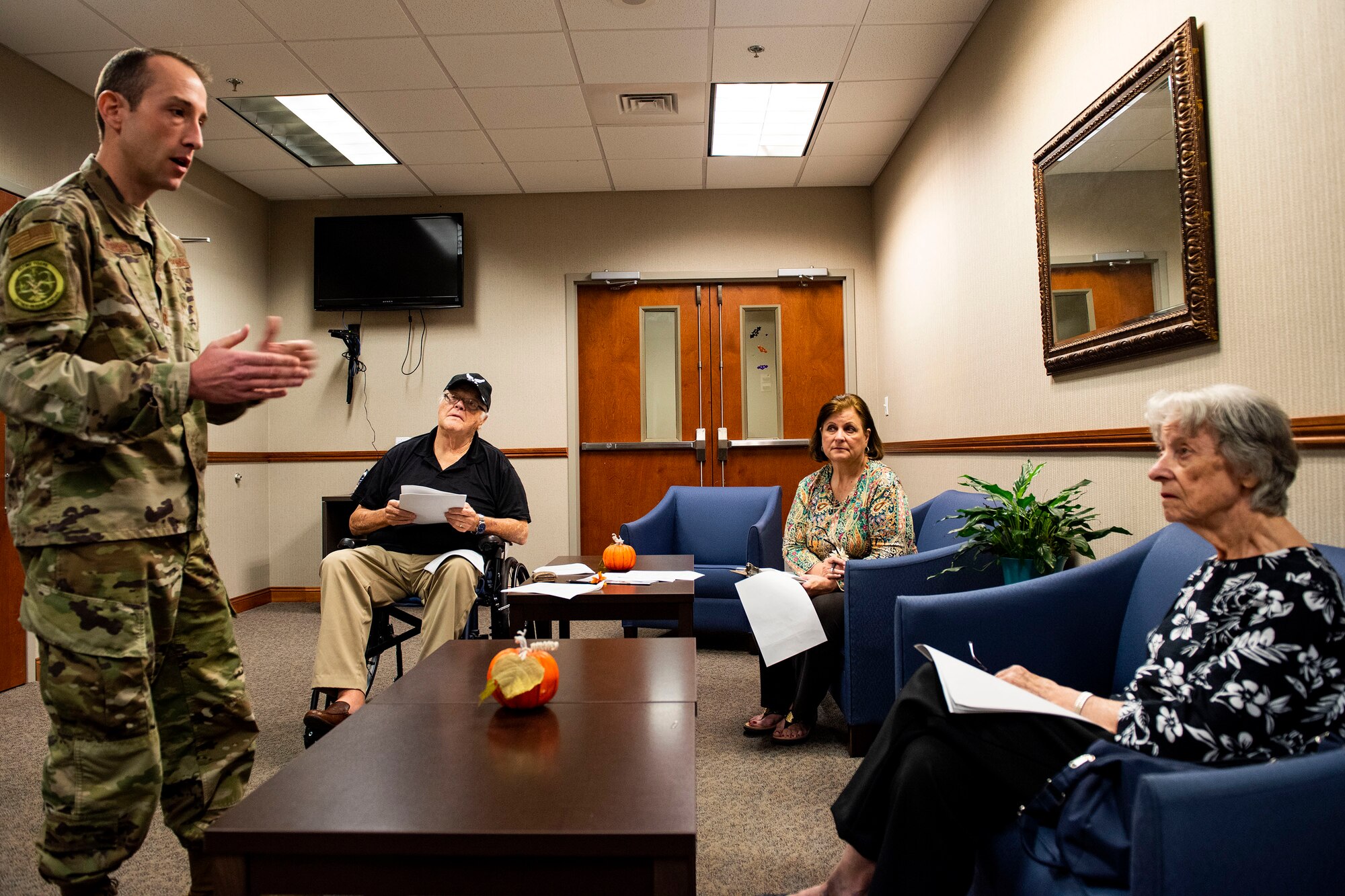 Capt. Phil Blevins, left, 23d Wing chief of general law, advises retirees on their wills Oct. 8, 2019, at Moody Air Force Base, Ga. The judge advocate office regularly aids retirees and military members with wills on Tuesdays. This free legal assistance provides personal and financial relief for customers and enables Airman readiness.  (U.S. Air Force photo by Senior Airman Erick Requadt)