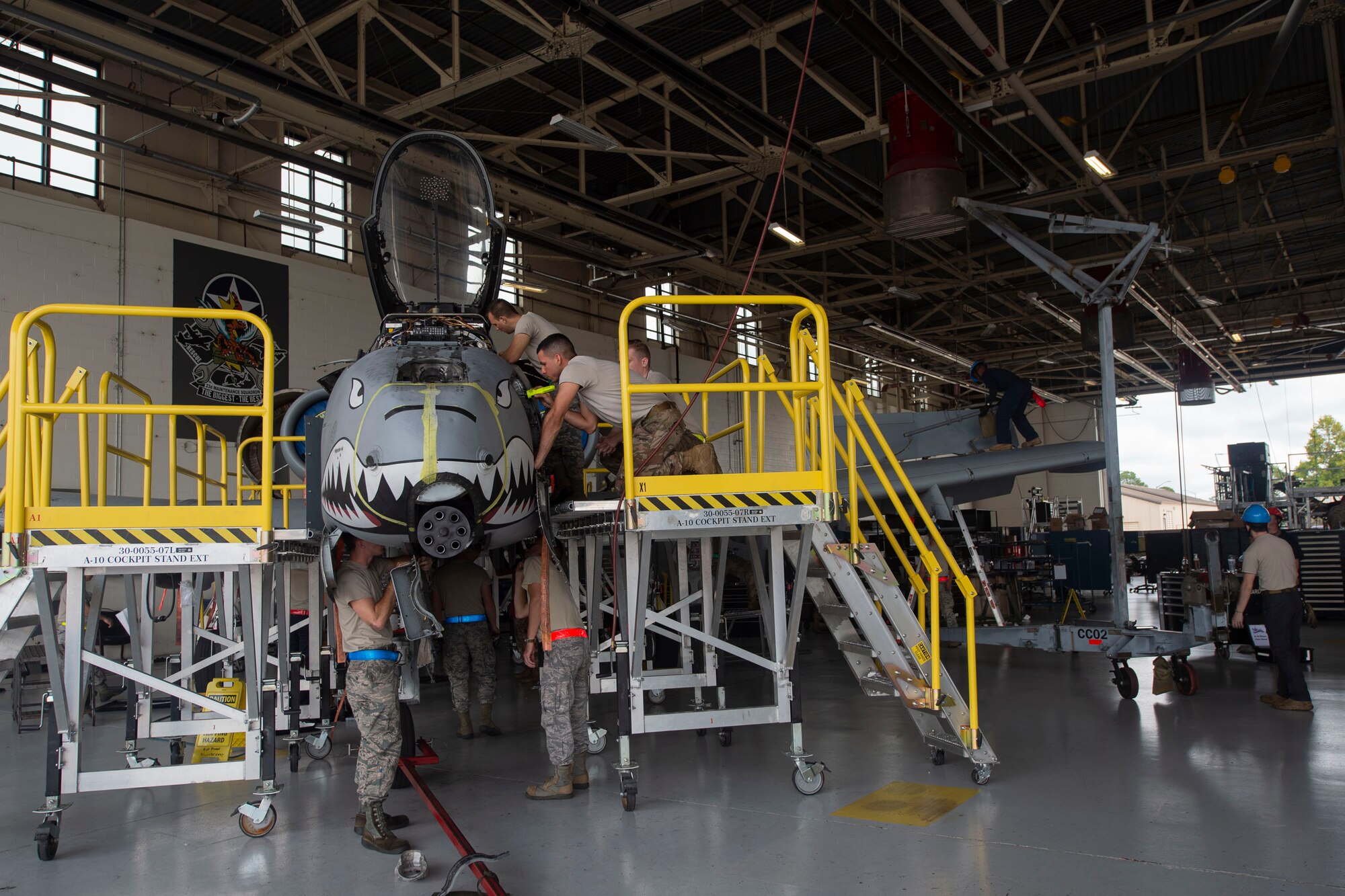 Airmen assigned to the 23d Maintenance Squadron (MXS) conduct an A-10C Thunderbolt II phase inspection Oct. 8, 2019, at Moody Air Force Base, Ga. The 23d MXS maintainers depanel the aircraft to reach the internal workings and perform in depth examinations on A-10s after every 500 flight hours. These maintainers work day and night to ensure the aircraft are safe and reliable combat assets. (U.S. Air Force photo by Airman Azaria E. Foster)