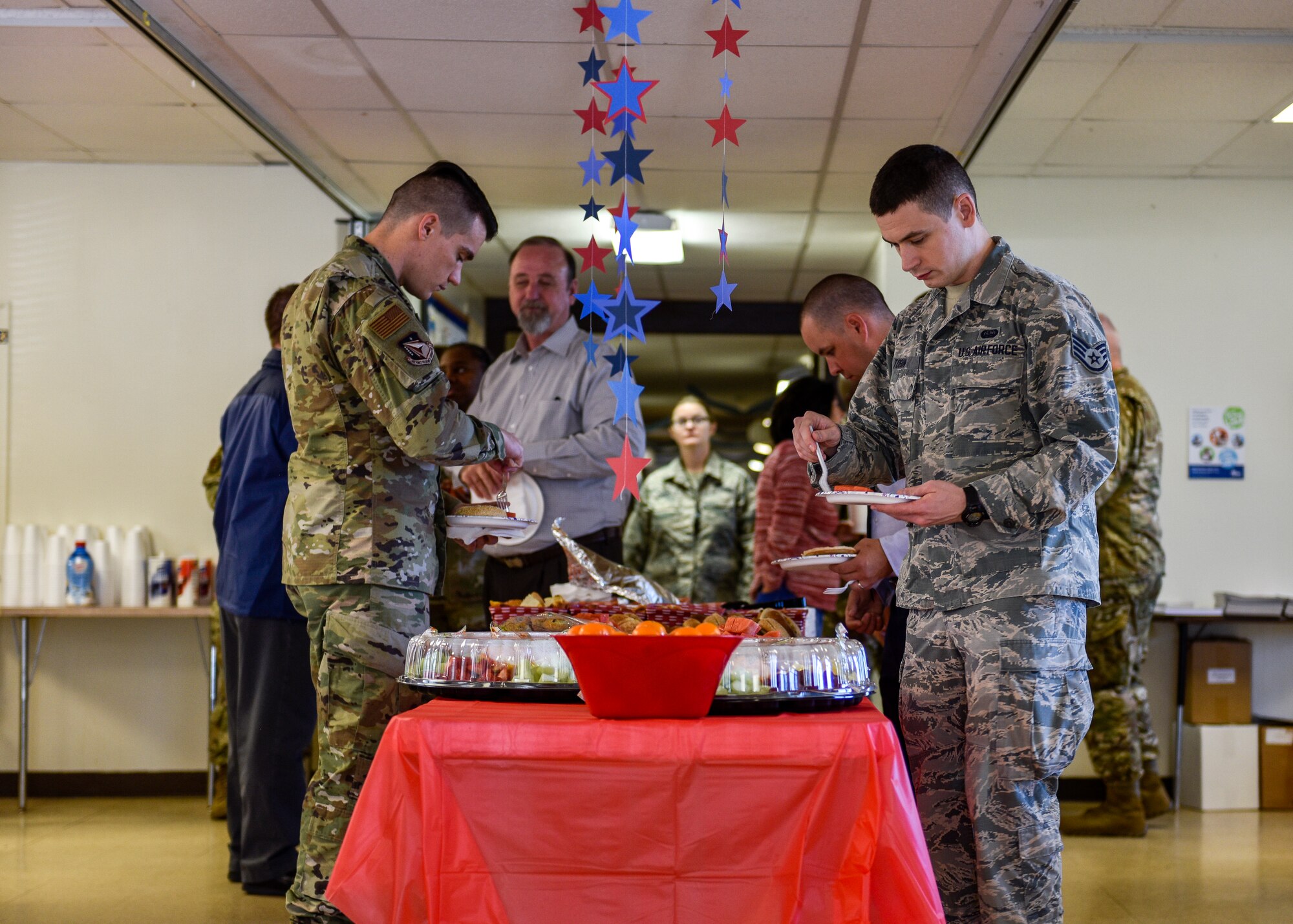 Participants in the Combined Federal Campaign breakfast event get food at Kirtland Air Force Base, N.M., Oct. 7, 2019. The CFC Kirtland AFB fundraising goal for 2019 is $126,000. (U.S. Air Force photo by Airman 1st Class Austin J. Prisbrey)