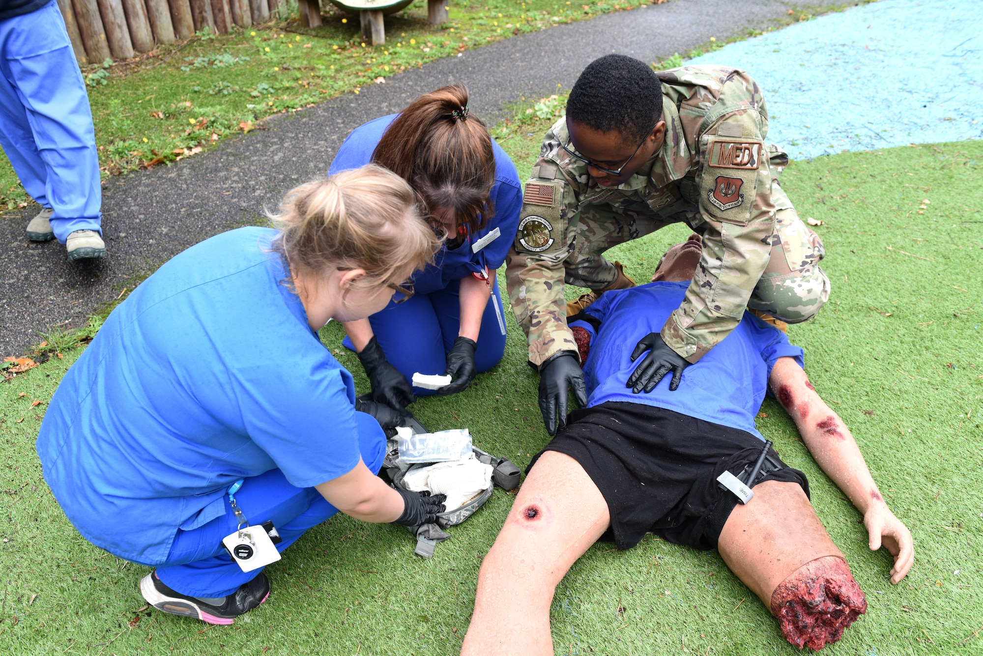 U.K. National Health Service partners practice resuscitation techniques during a hands-on war environment simulation as part of an immersion tour at Royal Air Force Lakenheath, England, Oct. 4, 2019. NHS medical personnel visited the Liberty Wing to gain knowledge and insight of the base’s medical training simulation capabilities. (U.S. Air Force photo by Airman 1st Class Rhonda Smith)
