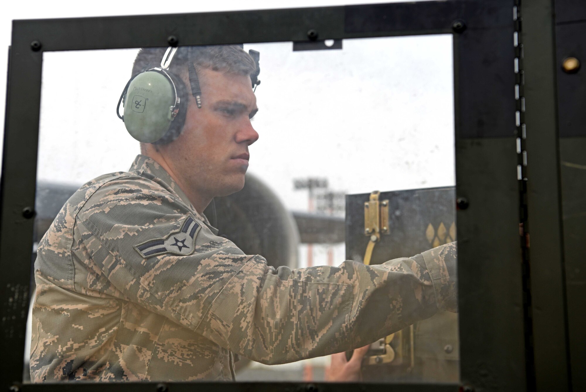 Airman 1st Class David Lyle, 100th Aircraft Maintenance Squadron crew chief, performs pre-flight checks during a readiness exercise at RAF Mildenhall, England, Oct. 3, 2019. Exercise scenarios were designed to ensure 100th Air Refueling Wing Airmen were fully prepared for potential contingencies in the wing’s area of responsibility. (U.S. Air Force photo by Airman 1st Class Brandon Esau)