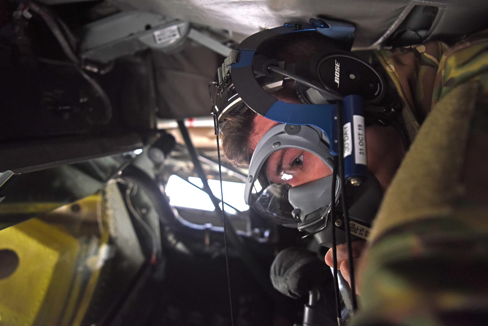 Airman 1st Class Benjamin Blake, 351st Air Refueling Squadron boom operator, checks his oxygen mask prior to takeoff during a readiness exercise at RAF Mildenhall, England, Oct. 3, 2019. Exercise scenarios were designed to ensure 100th Air Refueling Wing Airmen were fully prepared for potential contingencies in the wing’s area of responsibility. (U.S. Air Force photo by Airman 1st Class Brandon Esau)