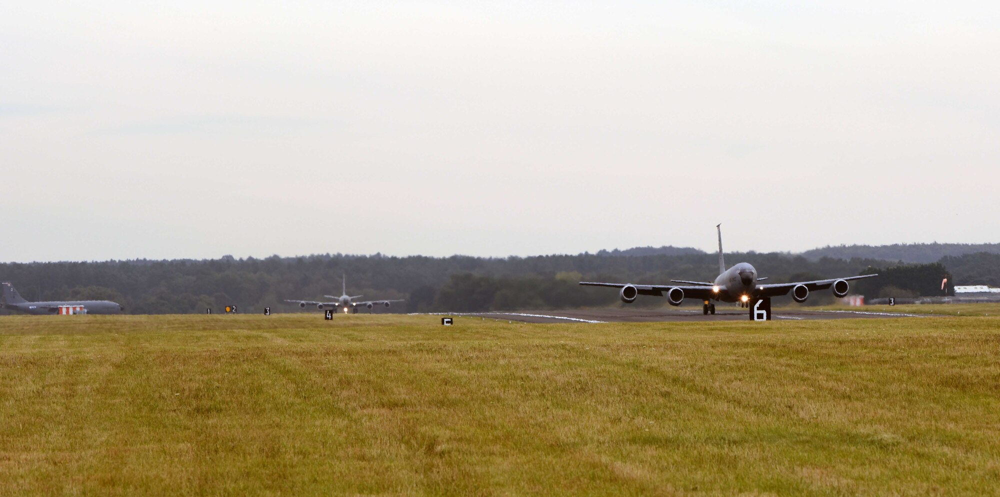 KC-135 Stratotankers assigned to the 100th Air Refueling Wing take-off in a four-ship formation during a readiness exericse at RAF Mildenhall, England, Oct. 3, 2019. Exercise scenarios were designed to ensure 100th ARW Airmen were fully prepared for potential contingencies in the wing’s area of responsibility. (U.S. Air Force photo by Karen Abeyasekere)