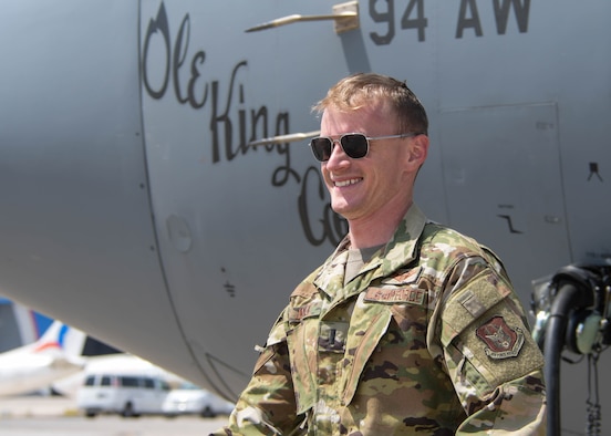 1st Lt. Mike Jolly, a 700th Airlift Squadron pilot, smiles as he steps off the C-130H3 he piloted for Exercise Eager Lion in Jordan on Sept. 1, 2019. Exercise Eager Lion is a multi-national exercise where Dobbins Air Reserve Base is the primary provider of air support. (U.S. Air Force photo by Senior Airman Josh Kincaid)