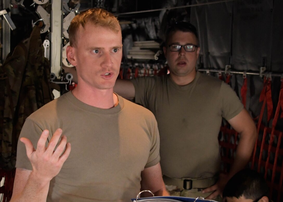 1st Lt. Mike Jolly, a 700th Airlift Squadron pilot, briefs Airmen before taking off on a training flight for Exercise Eager Lion in Jordan on Sept. 1, 2019. Exercise Eager Lion is a multi-national exercise where Dobbins Air Reserve Base is the primary provider of air support. (U.S. Air Force photo by Senior Airman Josh Kincaid)