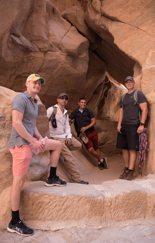 1st Lt. Mike Jolly poses for a photo with a group of Airmen from Dobbins Air Reserve Base, Georgia, at Petra in Jordan during a break from Exercise Eager Lion on Aug. 30, 2019. Exercise Eager Lion is a multi-national exercise where Dobbins Air Reserve Base is the primary provider of air support. (U.S. Air Force photo by Senior Airman Josh Kincaid)