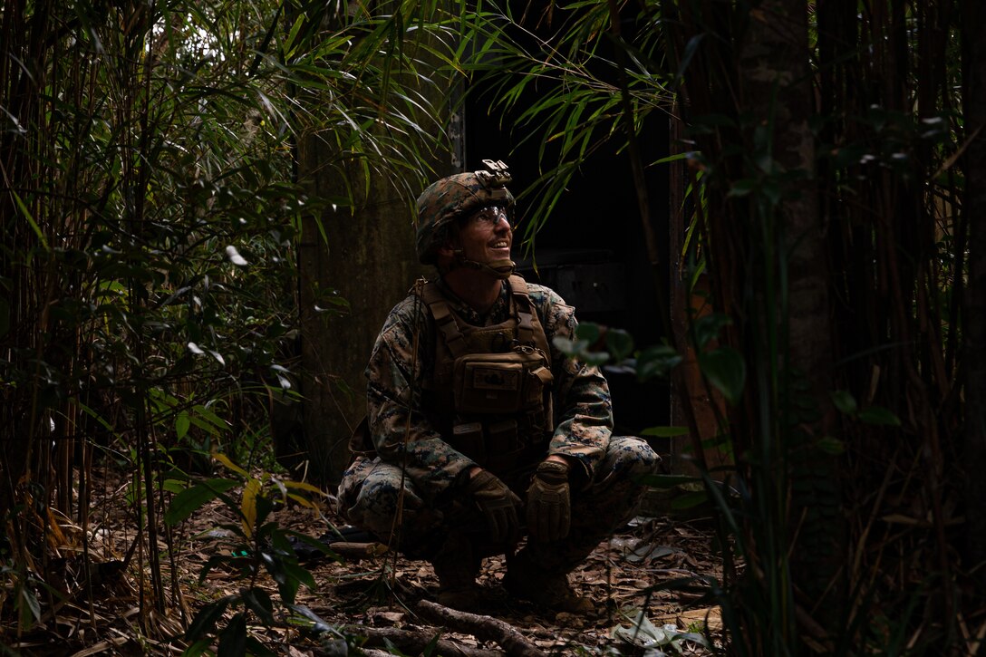 U.S. Marine Corps Staff Sgt. Jeffrey Meyer spots a trip wire while working through a bunker-clearing scenario during an explosive ordnance disposal exercise at the Jungle Warfare Training Center, Camp Gonsalves, Okinawa, Japan, September 17, 2019. The EOD exercise was designed to simulate conventional warfare and the use of conventional ordnance and involved the participation of three U.S. military branches and over 43 different military occupational specialties within III Marine Expeditionary Force. Meyer, a native of Oklahoma City, Oklahoma, is an EOD technician with EOD Company, 9th Engineer Support Battalion, 3rd Marine Logistics Group.