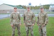 From left to right, Staff Sgt. Michael Bradley, Capt. John King and Staff Sgt. Jonathan Harper pose for a photo outside a warfighter exercise at Fort Indiantown Gap, Pennsylvania. The trio rushed to the aid of fellow citizens after a three vehicle crash on Interstate 81, Sept. 30.