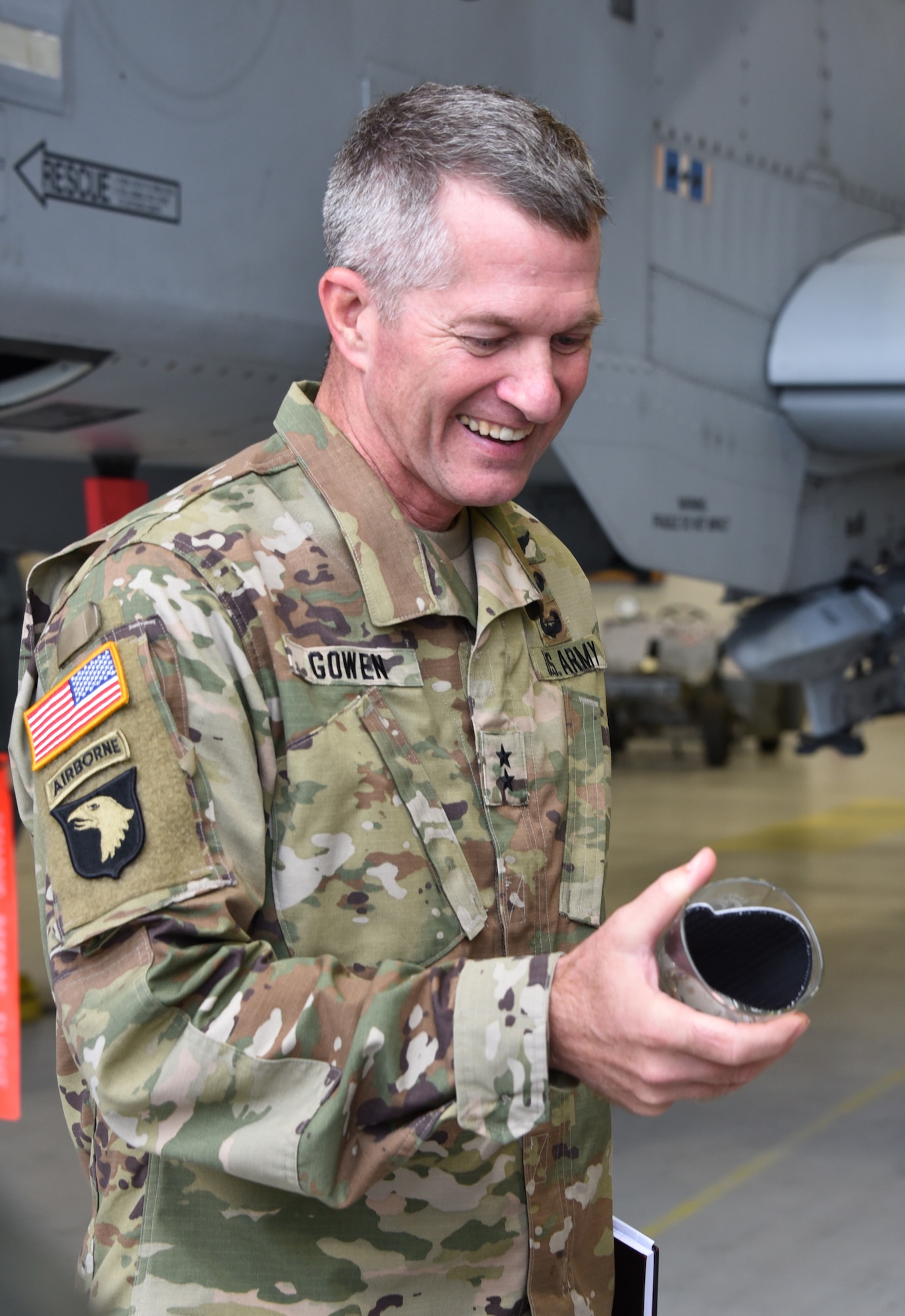 U.S. Army Maj. Gen. Timothy E. Gowen, adjutant general for Maryland, receives a gift from senior leaders from the 175th Wing, Maryland Air National Guard Oct. 6, 2019 during his initial visit to the base in Middle River, Md.
