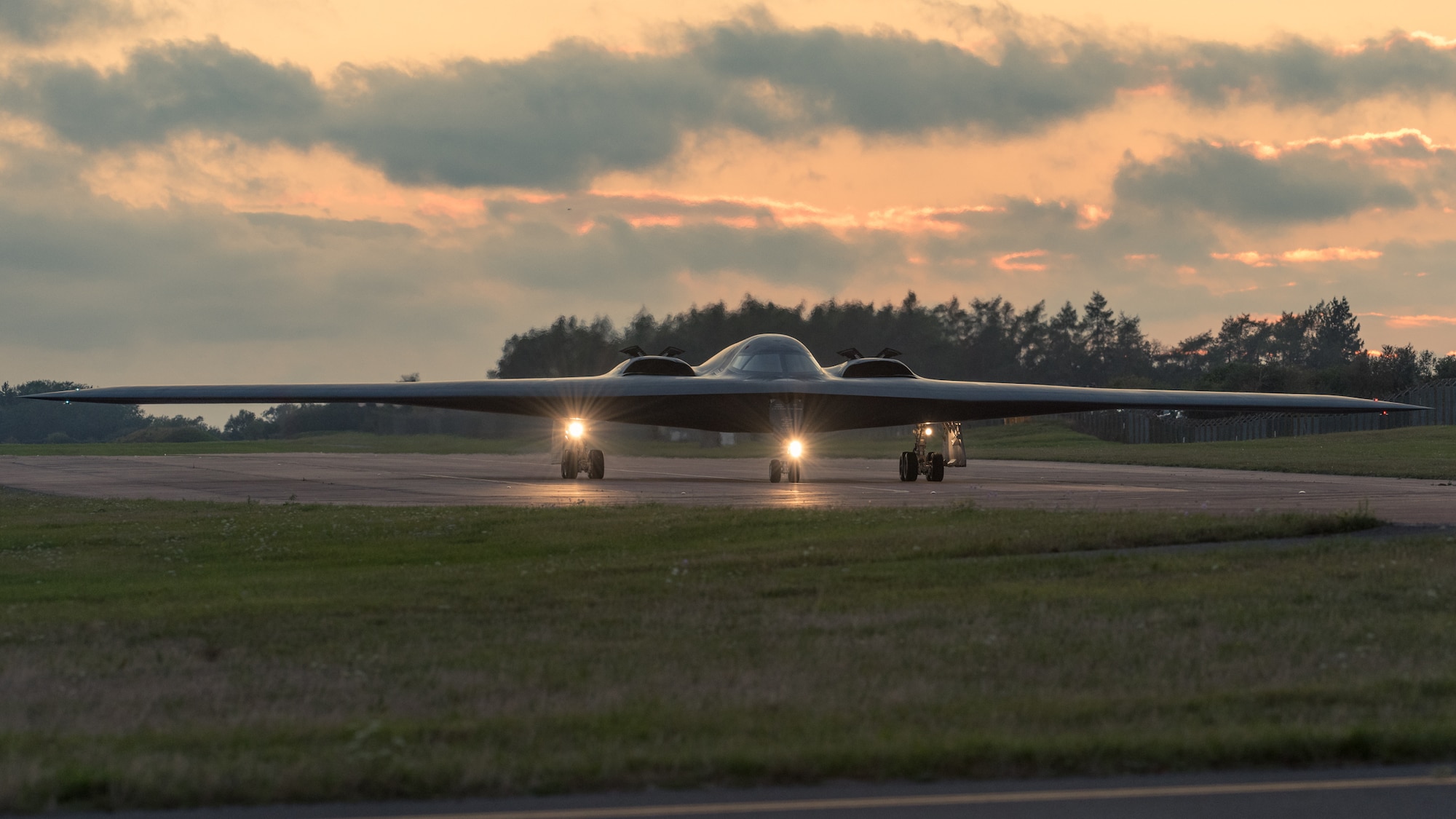 A B-2 Spirit Stealth Bomber, assigned to the 509th Bomb Wing, at Whiteman Air Force Base, Missouri, taxis down a runway at Royal Air Base Fairford, England, on September 11, 2019. Three B-2 bombers, Airmen and support equipment from Whiteman AFB deployed to RAF Fairford as part of Bomber Task Force Europe. Bomber missions like BTF Europe, help familiarize aircrews with air bases, airspace and operations in different geographic combatant commands. These multinational missions strengthen professional relationships and improves overall coordination with allies and partner militaries. (U.S. Air Force photo by Senior Airman Thomas Barley)