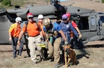 Volunteer search and rescue personnel practice basic helicopter orientation during the safety and awareness course Oct. 4-6 at Walker Creek Ranch, Petaluma, Calif. Some rescuers attended with their rescue dogs from California Rescue Dog Association (CARDA), a free and direct resource of Cal OES’ Law and Enforcement Division.