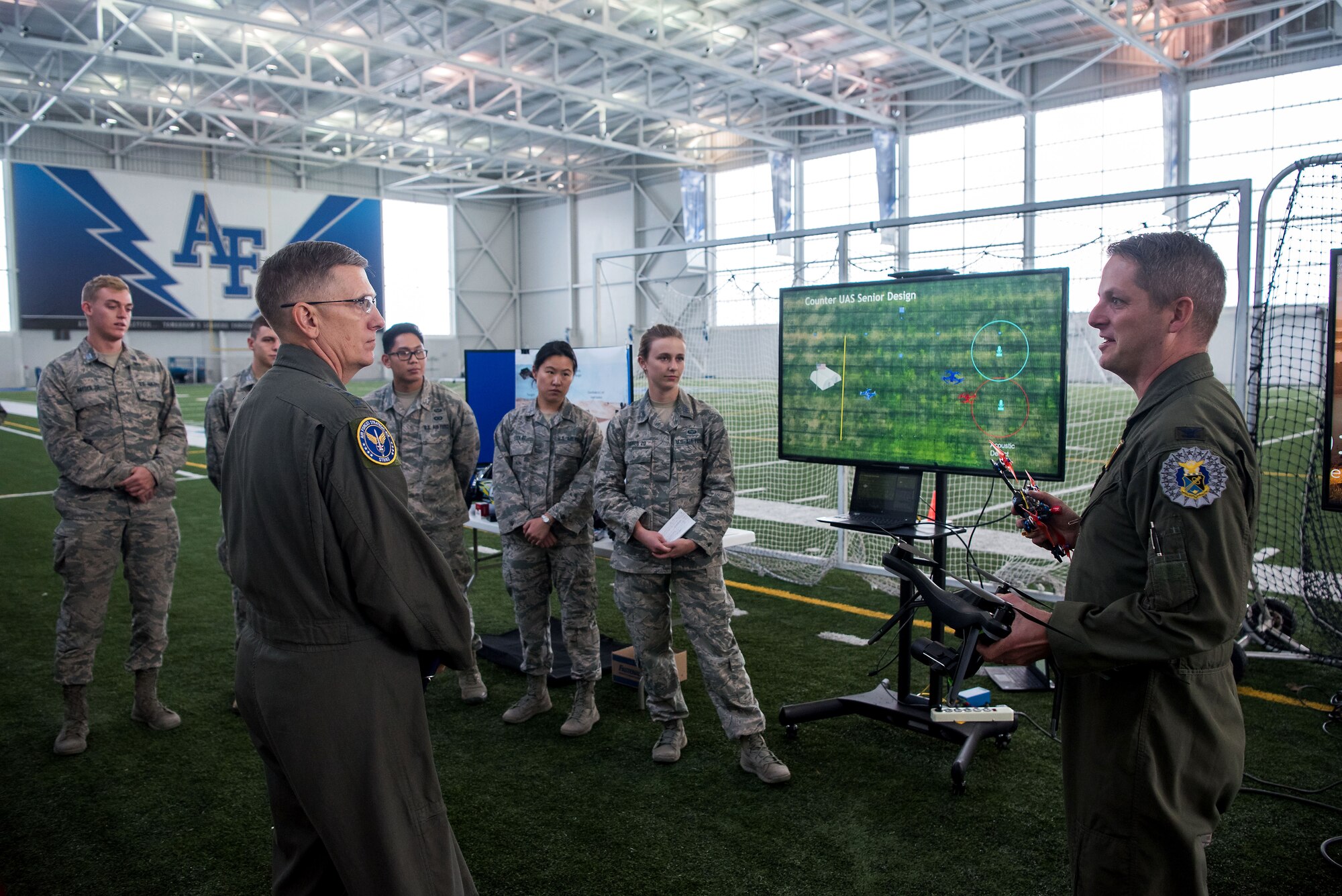 Col. Brian Neff, Head of the Department of Electrical and Computer Engineering, gives Gen. Tim Ray, Air Force Global Strike Command commander, an overview briefing of the Air Force Academy’s Unmanned Aerial Systems program Oct. 2, 2019, at the U.S. Air Force Academy, Colo. The UAS research program serves as a platform for cadets across various disciplines to conduct meaningful research supporting the warfighter within the UAS and Unmanned Aerial Vehicles domain. (U.S. Air Force photo by Trevor Cokley)