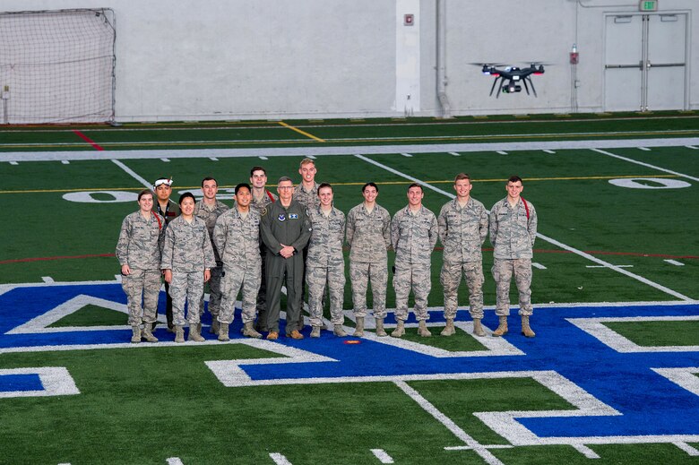 Col. Brian Neff, Head of the Department of Electrical and Computer Engineering, shows Gen. Tim Ray, Air Force Global Strike Command commander, how to use a pair of drone racing goggles during an immersion tour Oct. 2, 2019, at the U.S. Air Force Academy, Colo. As part of Ray’s visit to the Academy, he met with cadets and faculty members involved in the Unmanned Aerial Systems research program. (U.S. Air Force photo by Trevor Cokley)
