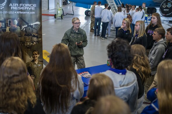 Staff Sgt. Jennifer Deimund, Air Force Reserve Recruiting, shares information about the Air Force Reserves to area high school students during the JROTC Day event at at Scott Air Force Base, Illinois, Oct. 8, 2019. More than 400 high school students from 11 schools across Missouri and Illinois learned about various careers in the Air Force. (U.S. Air Force photo by Christopher Parr)
