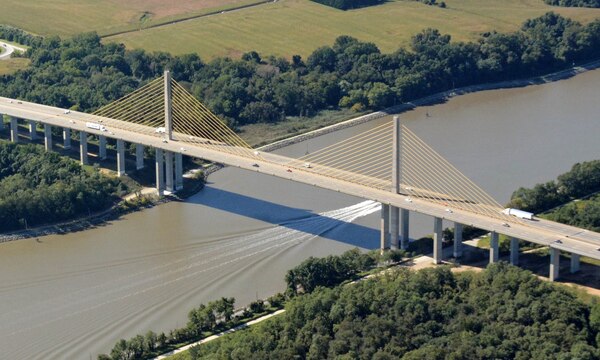 Photo shows the Senator William V. Roth, Jr. Bridge over the Chesapeake & Delaware Canal Waterway. The Senator William V. Roth, Jr. Bridge was built in 1995 and carries State Route 1 over the Chesapeake and Delaware Canal. The main span is 750 feet long and the overall length of the bridge is 4,650 feet.