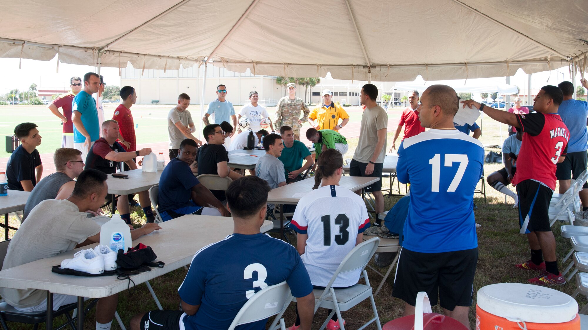 Soccer Tournament participants receive instructions prior to the start of MacDill’s first Hispanic Heritage Soccer Tournament, Oct. 4, 2019, at MacDill Air Force Base, Fla. The Hispanic Heritage Committee hosted their first Hispanic Heritage Month Soccer Tournament, in an effort to introduce Team MacDill to a piece of Hispanic Culture. (U.S. Air Force photo by Airman 1st Class Shannon Bowman)