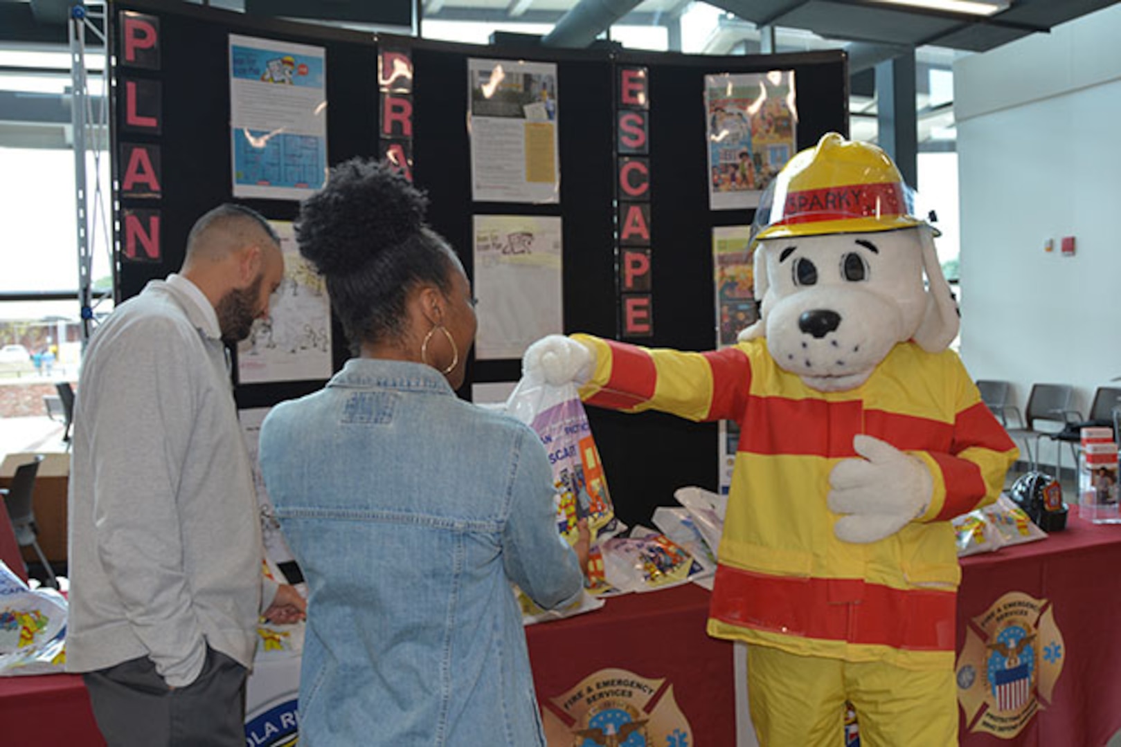 Sparky hands out fire prevention materials
