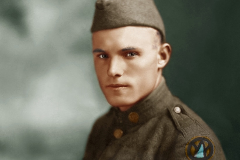 A World War I soldier in uniform wears several medals, including the Medal of Honor.