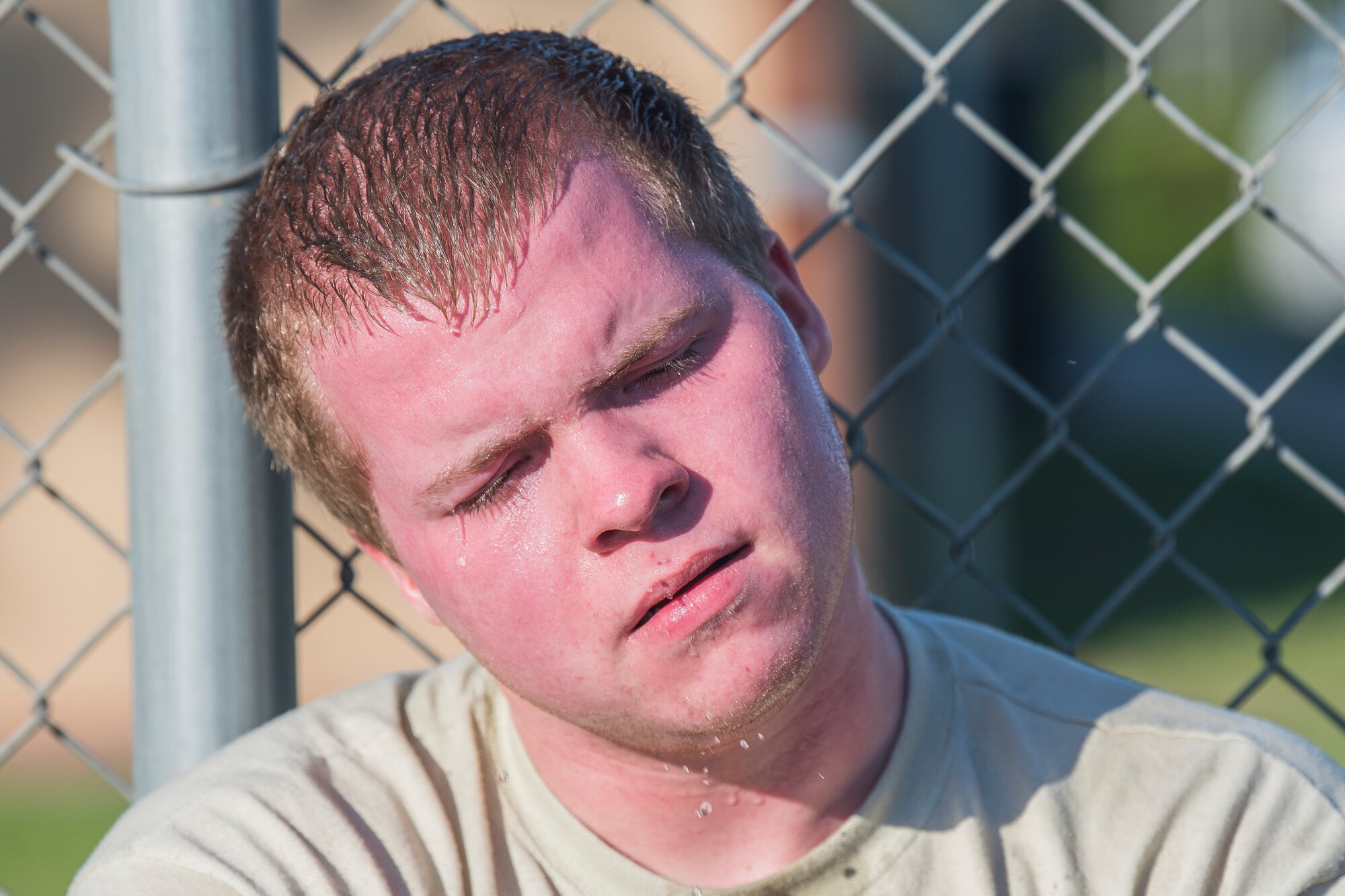 Airman 1st Class Kyle Fabrizius, 27th Special Operations Logistics Readiness Squadron fuels distribution technician, rests after his attempt of the Forward Air Refueling Point tryouts at Cannon Air Force Base, N.M., October 9, 2019. FARP tryouts are held when the team requires a new member but allow other career fields to attempt the challenge. (U.S. Air Force photo by Senior Airman Vernon R. Walter III)