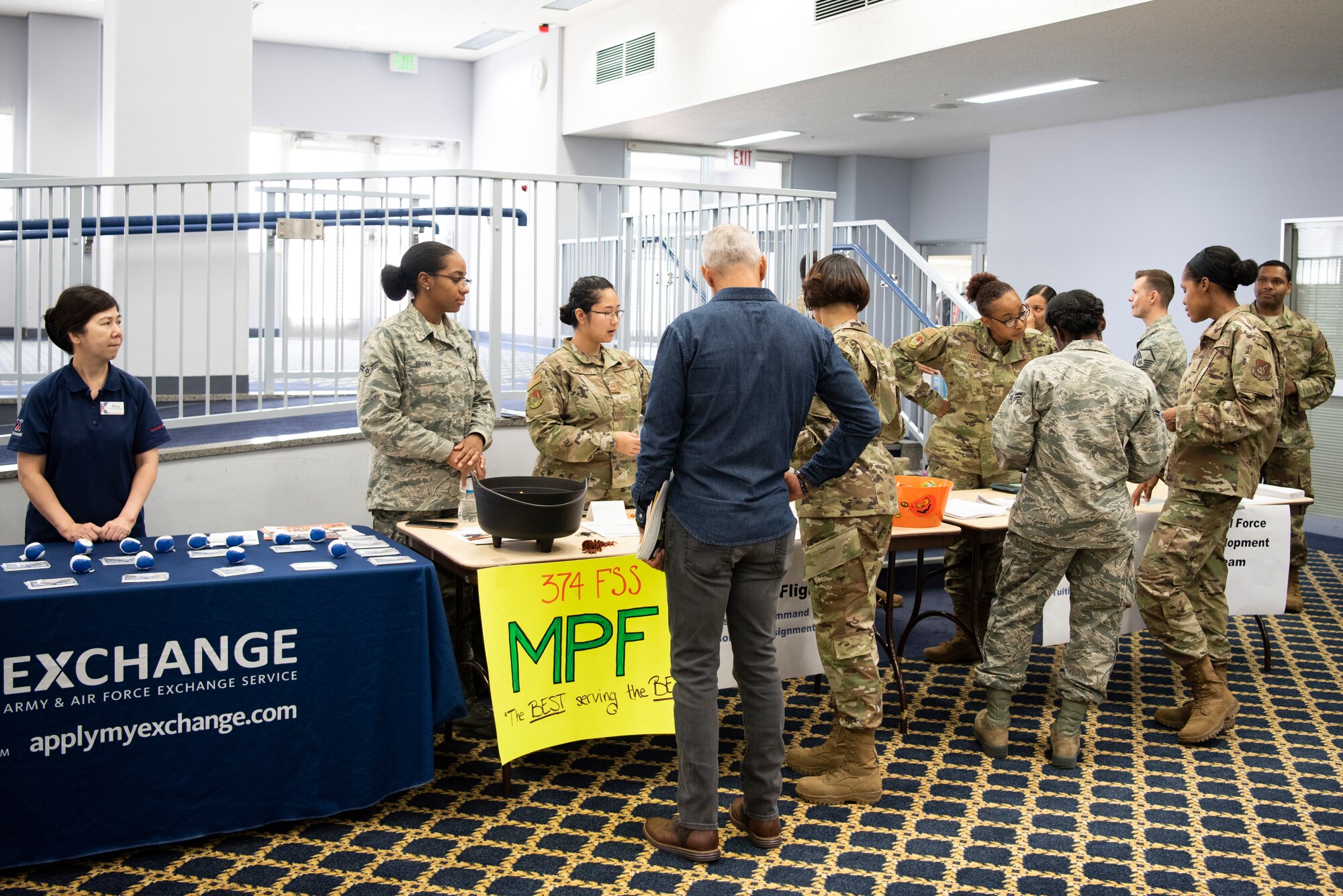 Members of Team Yokota share information on Oct. 2, 2019, at Yokota Air Base, Japan.