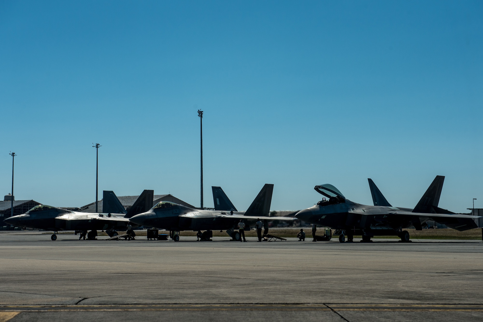 U.S. Air Force F-22 Raptors flown by the 94th and 149th Fighter Squadron pilots take off Oct. 30, 2018 from Tyndall  Air Force Base, Florida. After Hurricane Michael swept the area, multiple major commands have mobilized relief assets in an effort to restore operations after the hurricane caused catastrophic damage to the base. (US Air Force photo by Senior Airman Sean Carnes)