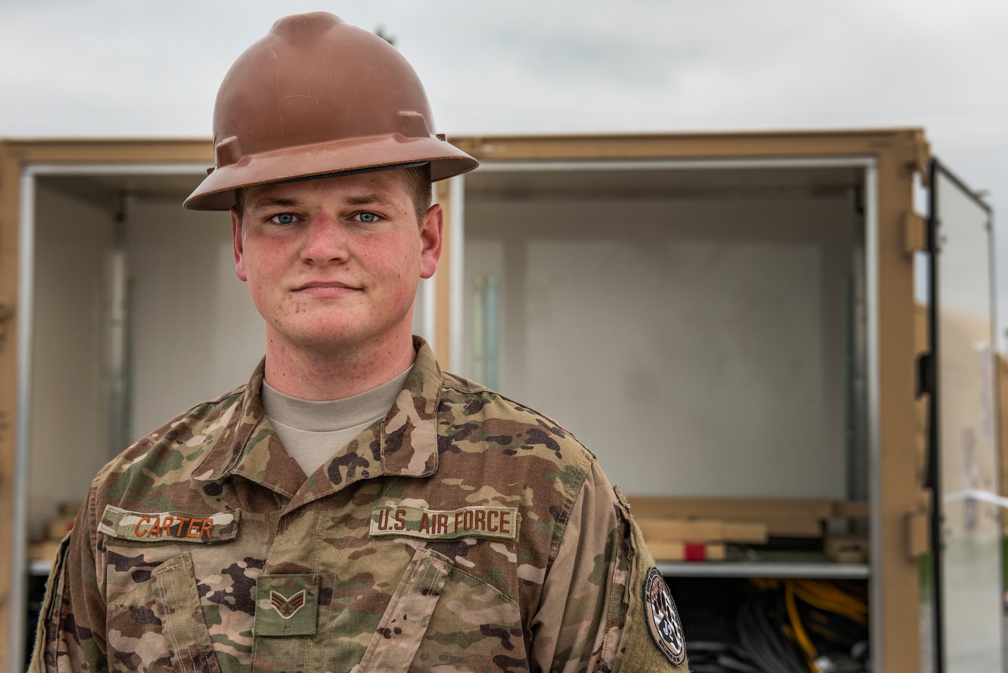 U.S. Air Force Senior Airman Thomas Carter, an Airman assigned to the 635th Material Maintenance Squadron, Holloman Air Force Base, New Mexico, stands for a portrait at Tyndall Air Force Base, Fla., March 4, 2019. Carter is currently here on a temporary duty assignment to provide additional support in recovery efforts to help rebuild Tyndall. (U.S. Air Force photo by Staff Sgt. Alexandre Montes)