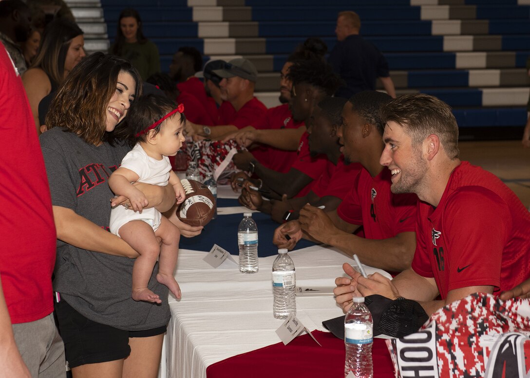 Danny Etling, Atlanta Falcons quarterback, converses with fans during a team meet-and-greet at the Bryant Fitness Center, Oct. 8, 2019, at Luke Air Force Base, Ariz.