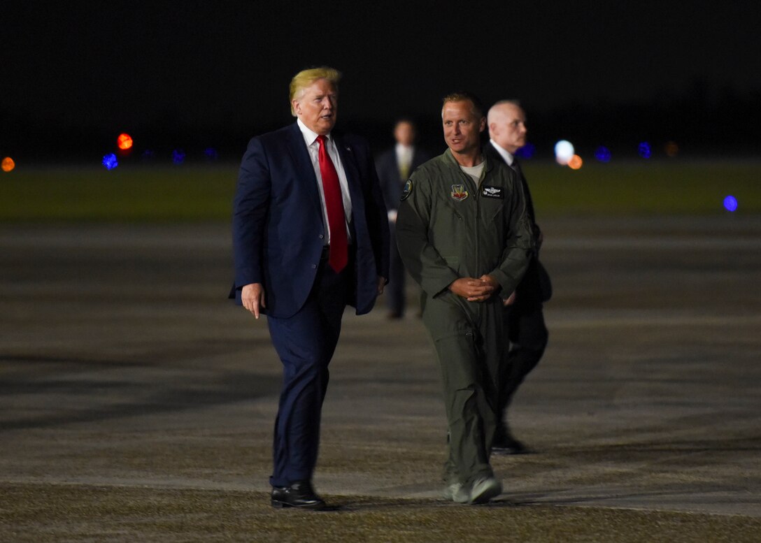 U.S. Air Force Col. Brian Laidlaw, 325th Fighter Wing commander, walks with President Donald J. Trump, after a flightline tour at Tyndall Air Force Base, Florida, May 8, 2019. Tyndall AFB leaders and civic leaders met with Trump to provide an update on base recovery efforts. (U.S. Air Force photo by Airman 1st Class Monica Roybal)