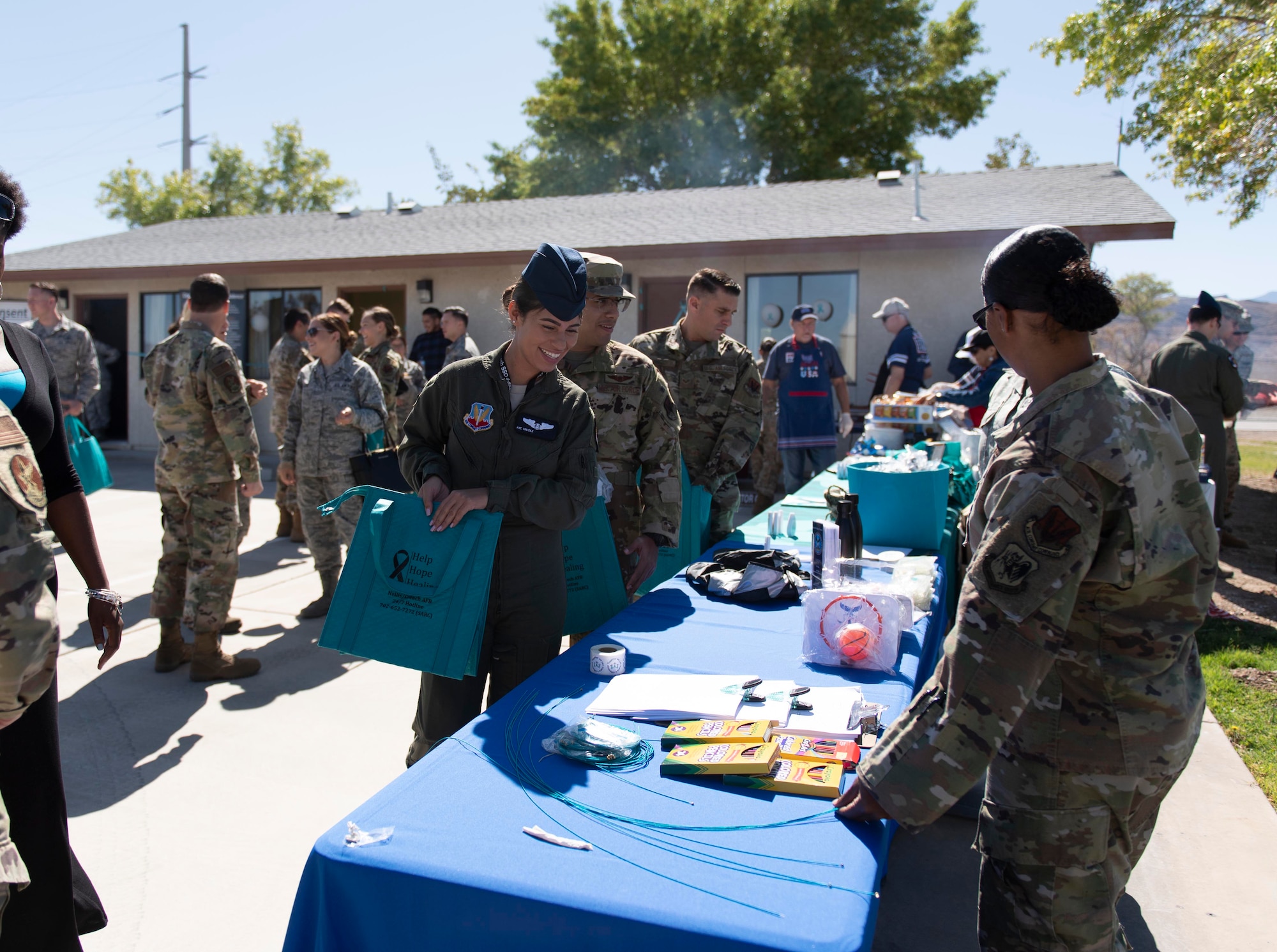 Airmen learn about the resources offered at the opening of the new Sexual Assault Prevention and Response Office, at Creech Air Force Base, Nevada, Sept. 30, 2019. One of the many other benefits of Creech having its own SAPR Office is that Airmen, contractors, and adult dependents won’t have to drive the hour-long commute to the Nellis AFB location. (U.S. Air Force photo by Senior Airman Lauren Silverthorne)