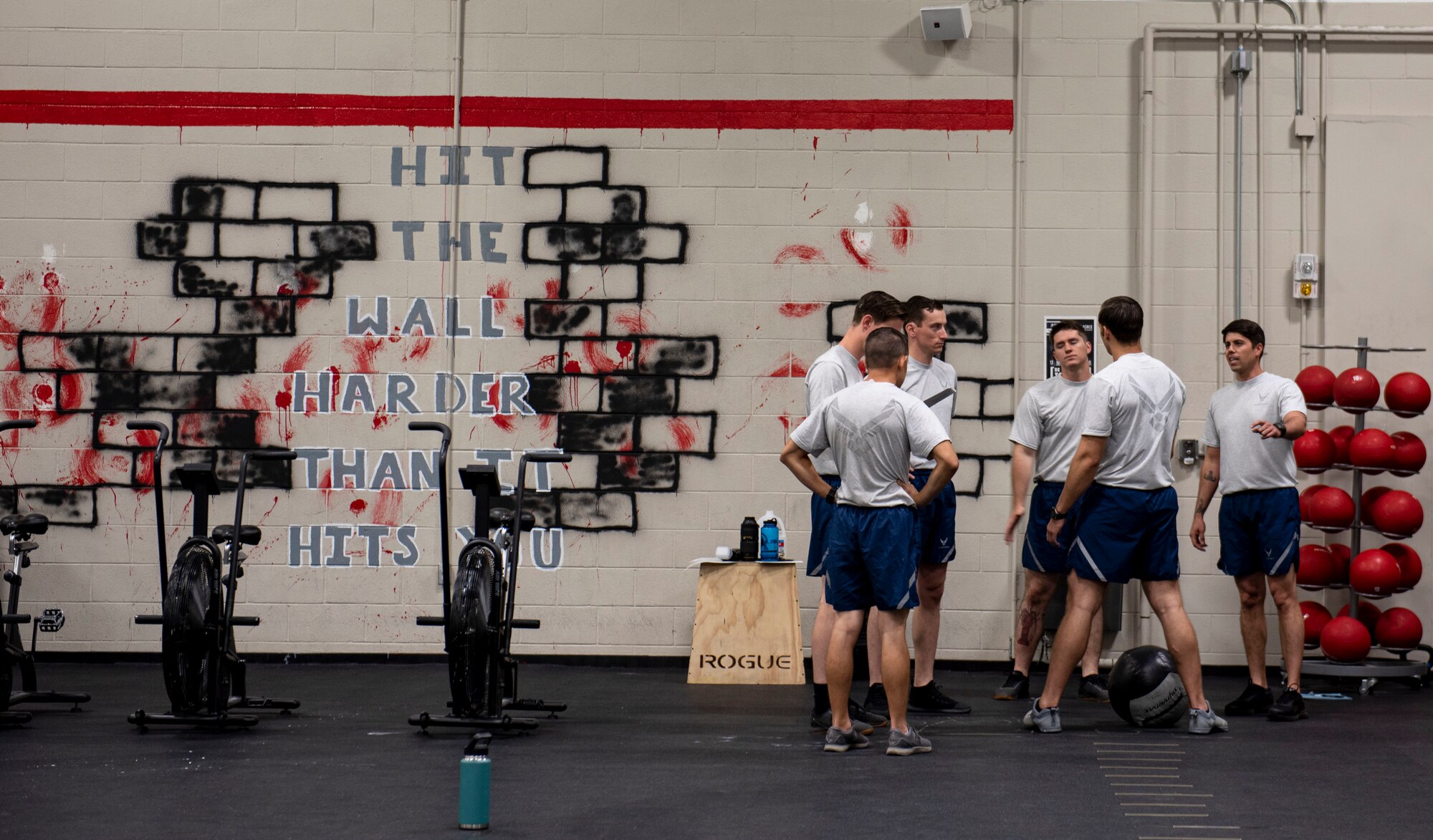 The 20th Civil Engineer Squadron, Explosive Ordnance Disposal (EOD) flight Airmen gather for a team pep-talk as they train for the new Tier 2 physical fitness test at Shaw Air Force Base, South Carolina, Oct. 4, 2019.