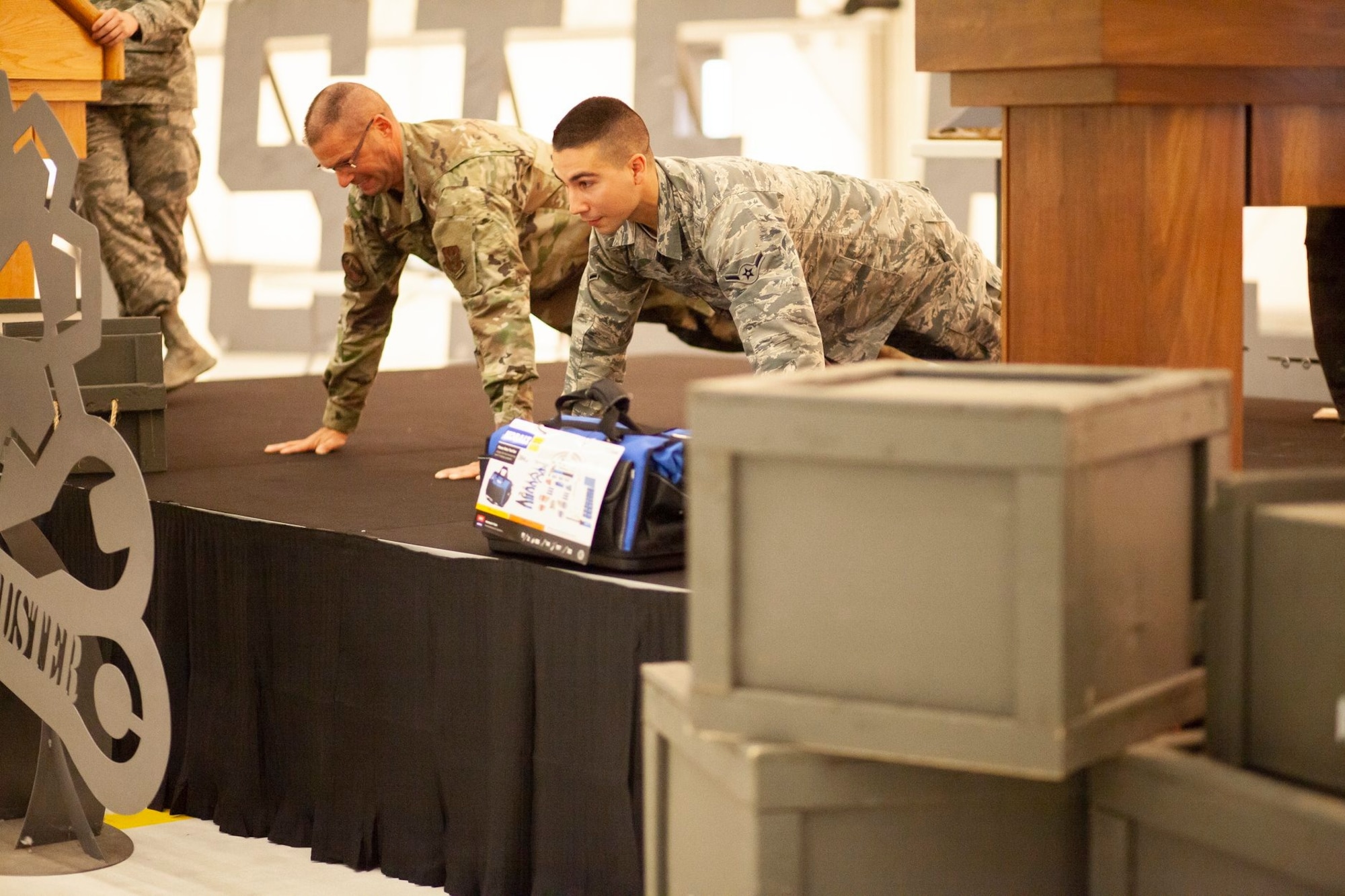 A group of maintainers from the 22nd Maintenance Squadron, celebrate as a fellow Airman receives an award during the Knucklebuster’s Award Ceremony Oct. 5, 2019, at McConnell Air Force Base, Kan. A total of 35 awards were given during the banquet.  (U.S. Air Force photo by 2nd Lt. Kaitlyn Danner)