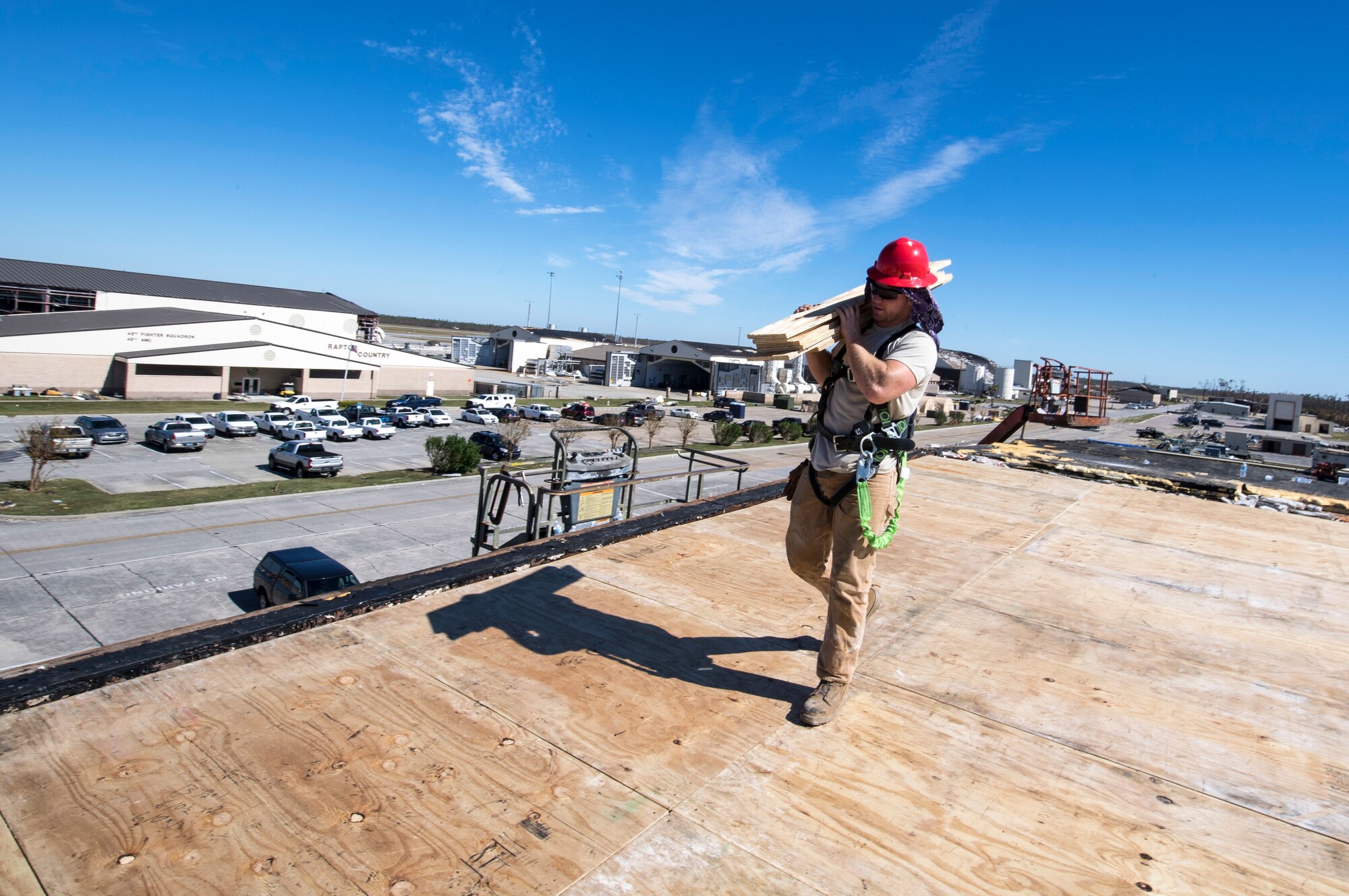 Civil engineers of the 823rd REDHORSE Squadron, Hurlburt Field, Fla., repair a roof at Tyndall Air Force Base just weeks after the Hurricane Michael, a category 5 storm, made landfall on Oct. 10, 2018.