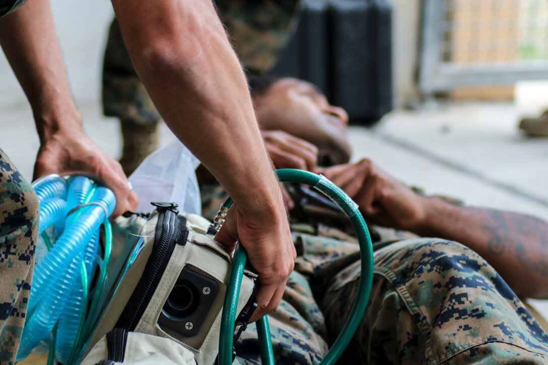 U.S. Navy Sailors with Special Purpose Marine Air-Ground Task Force-Crisis Response-Africa 20.1, Marine Forces Europe and Africa, conduct en route care training at Naval Air Station Sigonella, Italy, Oct. 7, 2019. Sailors of the forward resuscitative surgical system conducted the training to increase emergency response by expeditiously moving a casualty. The SPMAGTF-CR-AF is deployed to conduct crisis-response and theater-security operations in Africa and promote regional stability by conducting military-to-military training exercises throughout Europe and Africa. (U.S. Marine Corps photo by 2nd Lt. Grace Jenkins)