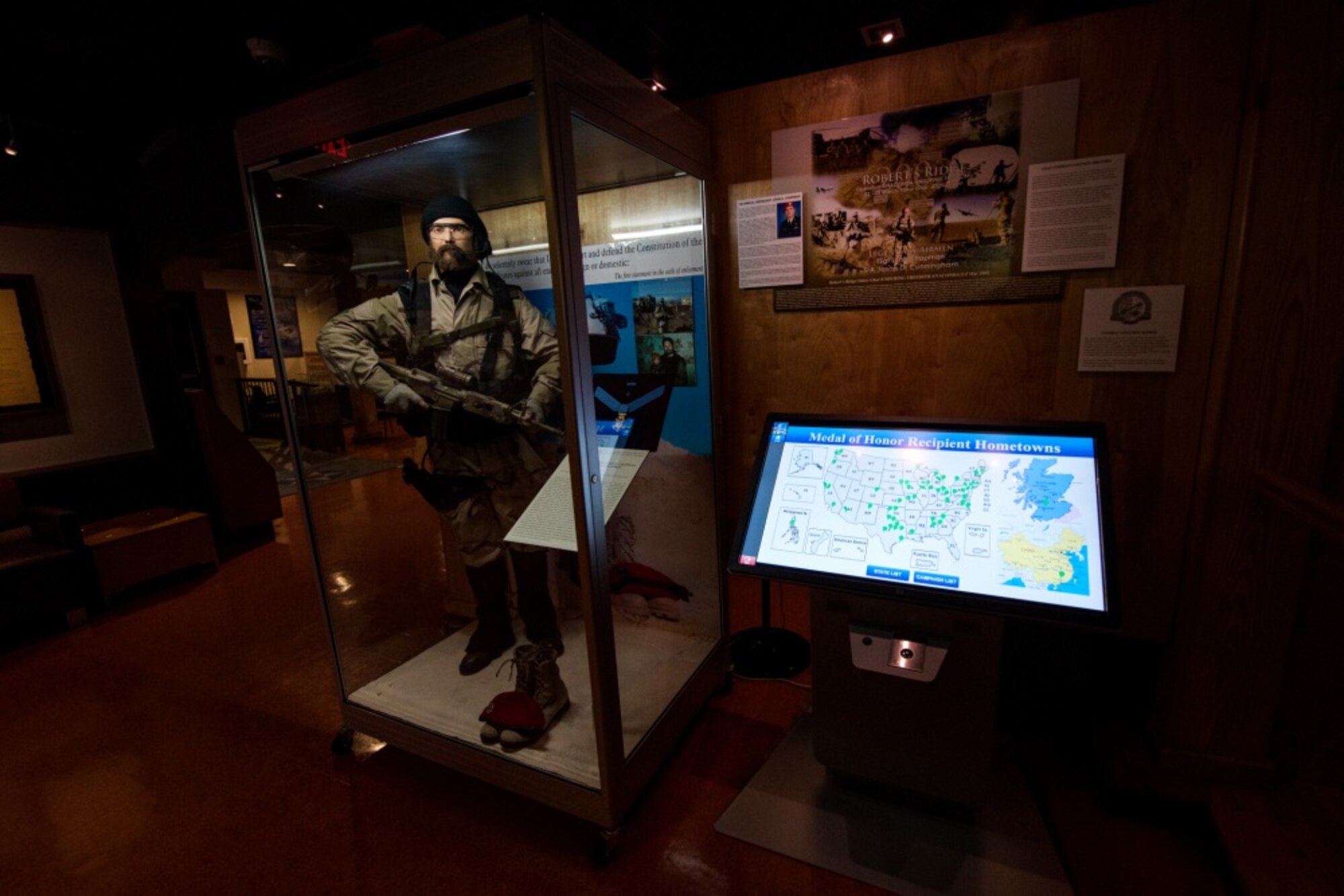 The Medal of Honor exhibit in the Airman Heritage Museum on Oct. 8, 2019, at Joint Base San Antonio-Lackland, Texas. The exhibit is an interactive touchscreen display that showcases the hometown, citation and photograph of 61 air component Medal of Honor recipients. (U.S. Air Force photo by Sarayuth Pinthong)