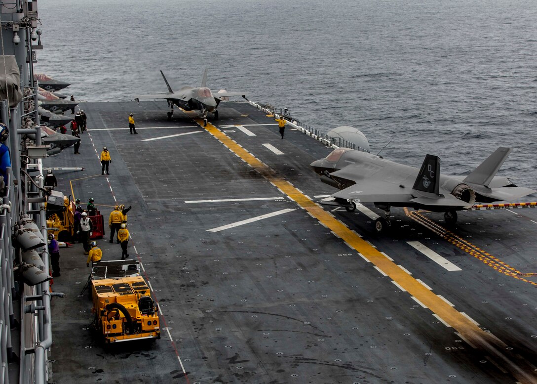 Two U.S. Marine Corps F-35B Lightning IIs with Marine Fighter Attack Squadron (VMFA) 122, Marine Aircraft Group (MAG) 13, 3rd Marine Aircraft Wing (MAW), prepares to depart the amphibious assault ship USS America (LHA 6) during routine training in the Eastern Pacific, Sept. 28, 2019. 3rd MAW is capable of conducting missions across the range of military operations and continues to promote the defense of our nation and its interests.  (U.S. Marine Corps photo by Lance Cpl. Juan Anaya)