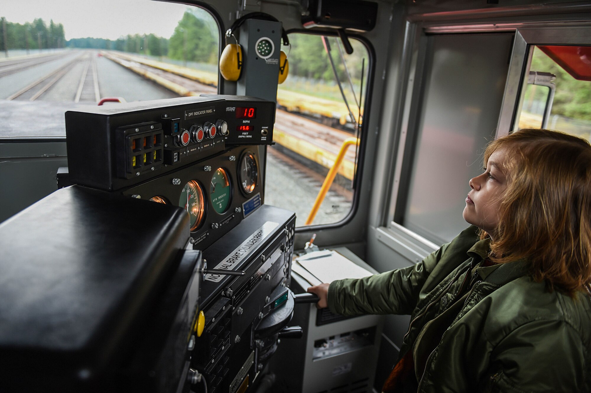 Declan Gaskill, Joint Base Lewis-McChord (JBLM) Pilot for a Day (PFAD) participant, operates a railway engine at the JBLM train depot as part of his PFAD itinerary May 21, 2019. The PFAD program is sponsored by the local Air Force Association and aims to gives kids with physical or mental difficulties a day to have fun and see part of what a military member might do in a workday.