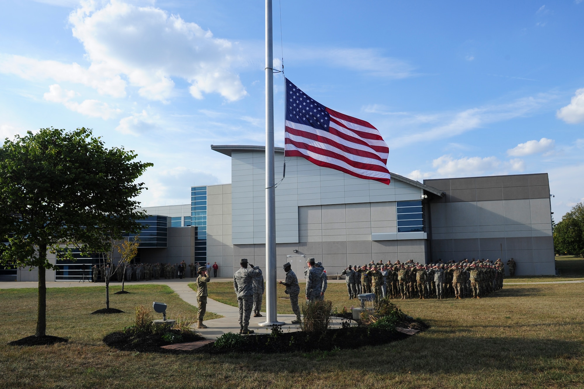 Members of the National Air and Space Intelligence Center, Global Exploitation Intelligence Group conduct a Retreat Ceremony on Oct. 1, 2019 at Wright-Patterson Air Force Base, Ohio. A Retreat Ceremony serves a twofold purpose. It signals the end of the official duty day and serves as a ceremony for paying respect to the flag.